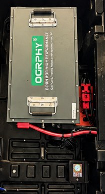 After: a single lithium battery pack installed in the same battery bay
